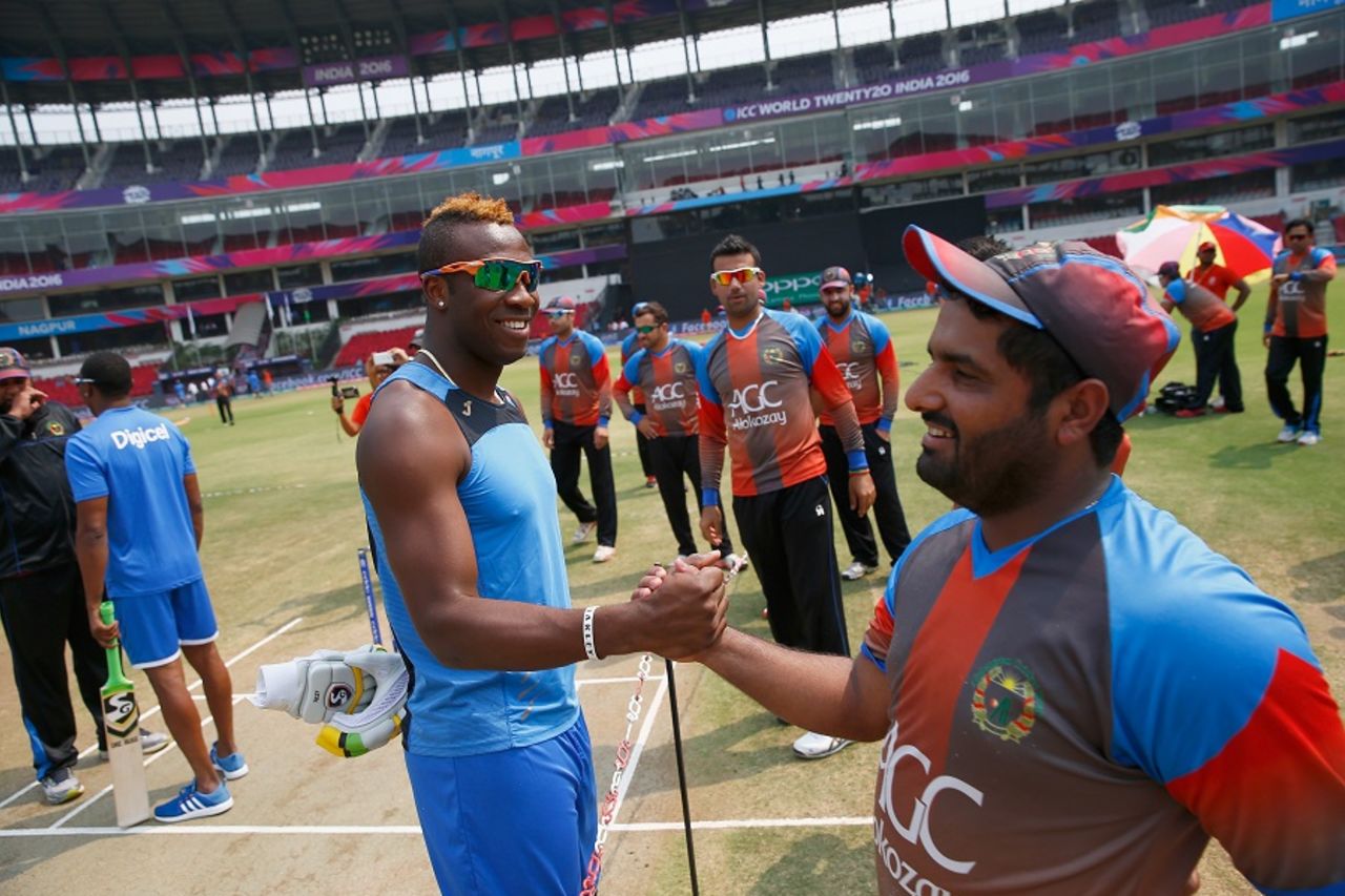 Andre Russell and Mohammad Shahzad exchange pleasantries, Afghanistan v West Indies, World T20 2016, Group 1, Nagpur, March 27, 2016