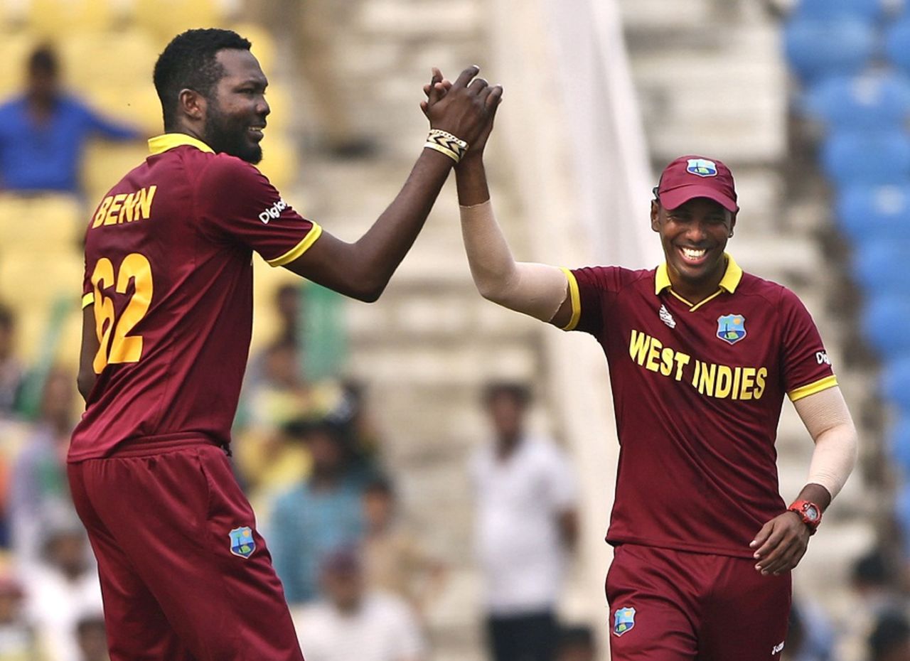 West Indies' spin-duo Samuel Badree and Sulieman Benn celebrate a wicket , Afghanistan v West Indies, World T20 2016, Group 1, Nagpur, March 27, 2016