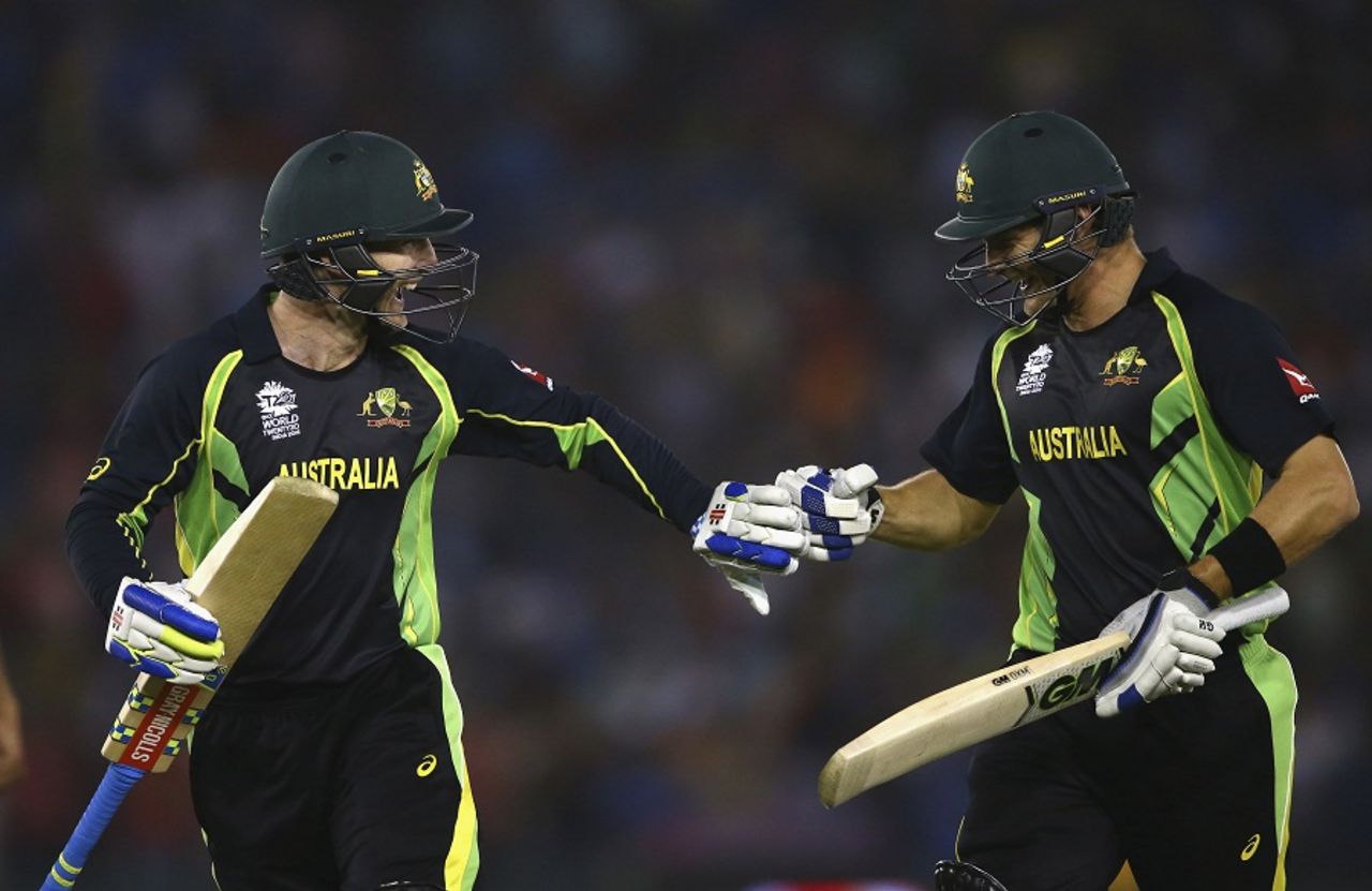 Peter Nevill and Shane Watson touch the gloves while leaving the field after Australia's innings, Australia v India, World T20 2016, Group 2, Mohali, March 27, 2016