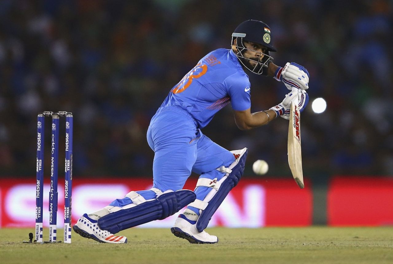 Virat Kohli guides the ball into the off side, Australia v India, World T20 2016, Group 2, Mohali, March 27, 2016