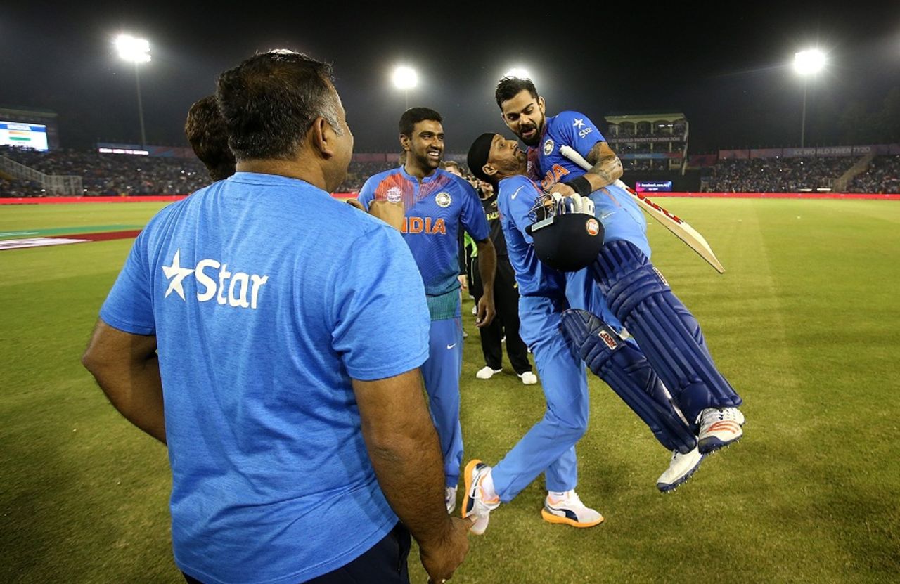 Harbhajan Singh lifts Virat Kohli after India's win, Australia v India, World T20 2016, Group 2, Mohali, March 27, 2016