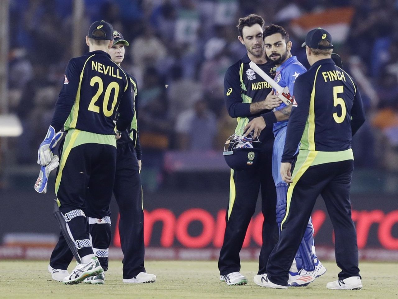 Virat Kohli is congratulated by Australia's players at the end of the game, Australia v India, World T20 2016, Group 2, Mohali, March 27, 2016