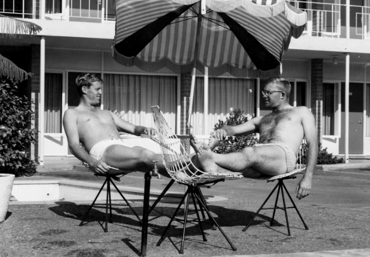 Graeme Pollock and Eddie Barlow relax by the pool after their 341-run stand in Adelaide, January 30, 1964