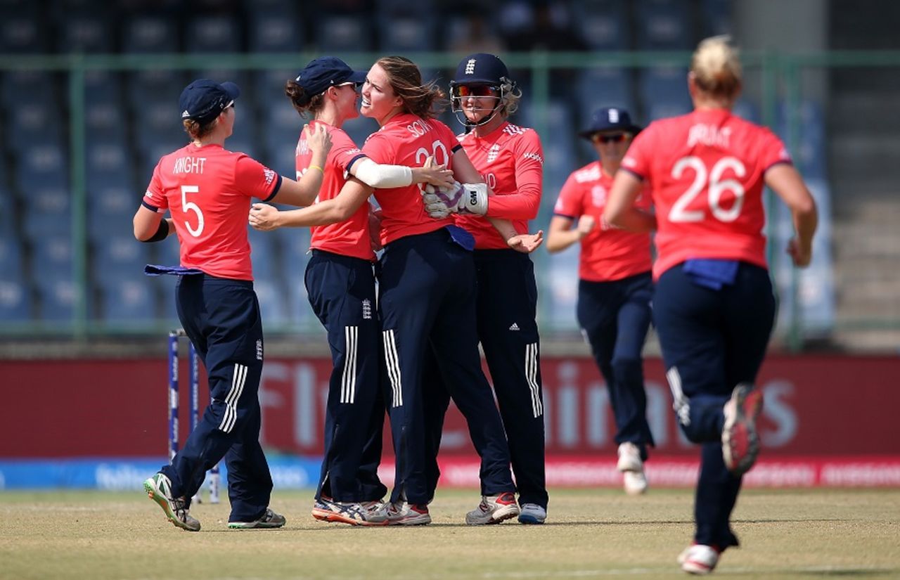 Natalie Sciver celebrates with team-mates after picking up a wicket, Australia v England, Women's World T20 2016, 1st semi-final, Delhi, March 30, 2016