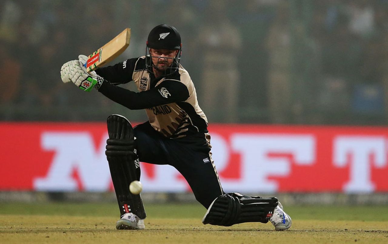 Colin Munro gets on one knee for a cover drive, England v New Zealand, World T20 2016, semi-final, Delhi, March 30, 2016
