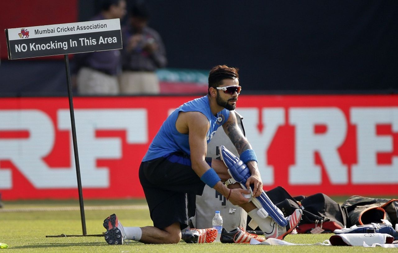 Virat Kohli pads up for a net session, Mumbai, March 30, 2016