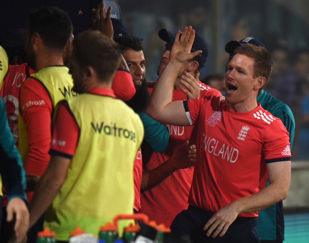 Eoin Morgan gives high fives all round after England's crushing win, England v New Zealand, World T20, Semi-final, Delhi, March 30, 2016