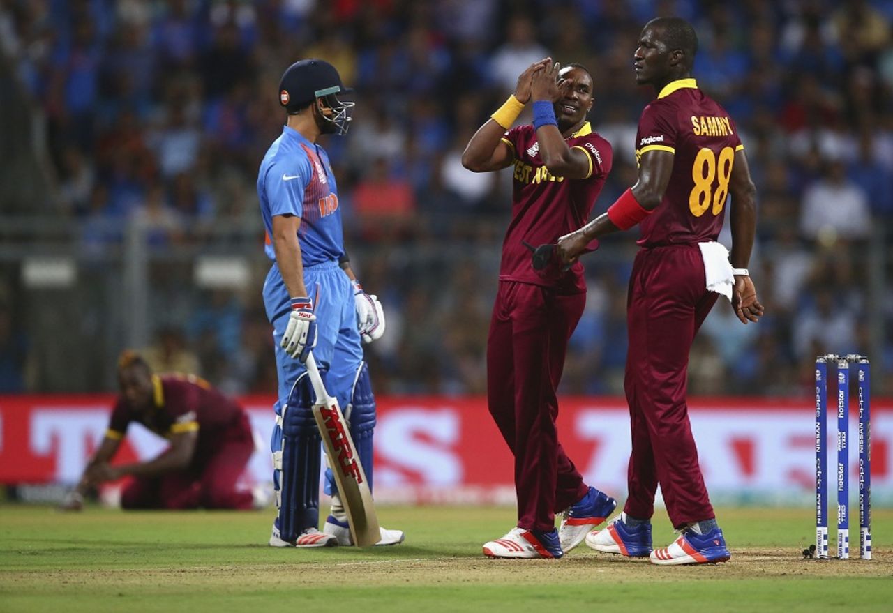 Dwayne Bravo, Darren Sammy are disappointed after missing two chances to run Virat Kohli out, India v West Indies, World T20 2016, semi-final, Mumbai, March 31, 2016