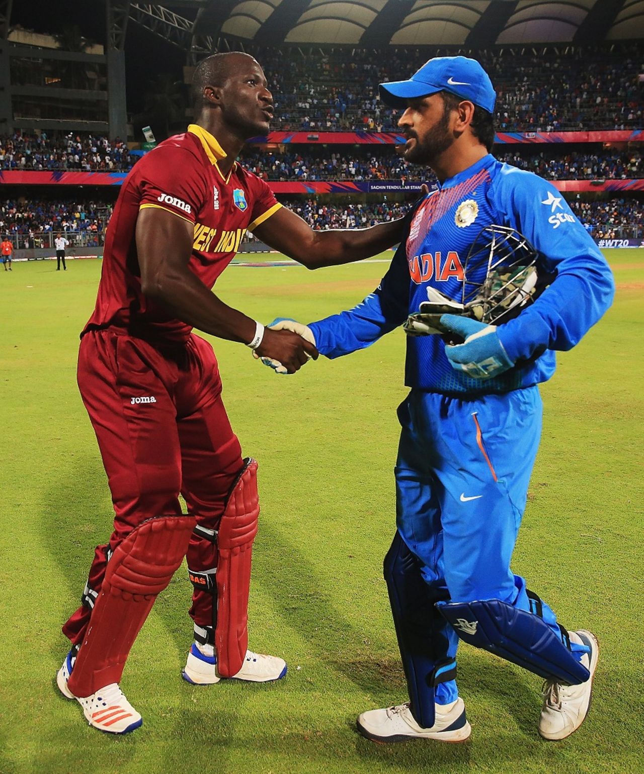 MS Dhoni and Darren Sammy greet each other after the match, India v West Indies, World T20 2016, semi-final, Mumbai, March 31, 2016