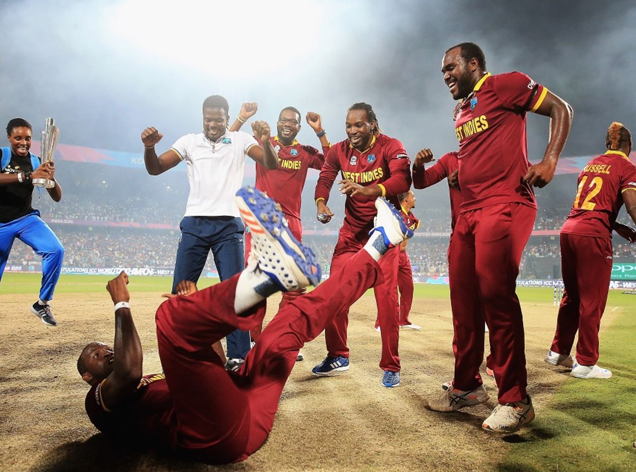 Darren Sammy celebrates the win with a dance even as his mates rejoice, England v West Indies, World T20, final, Kolkata, April 3, 2016 