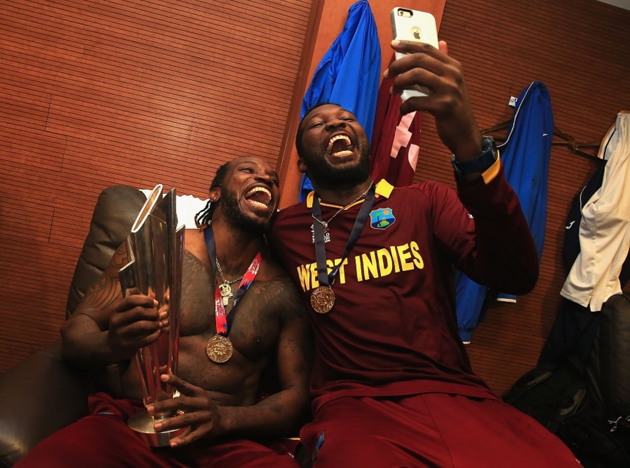 Celebrations spill over into the dressing room, where Chris Gayle and Sulieman Benn are all smiles, England v West Indies, World T20, final, Kolkata, April 3, 2016 