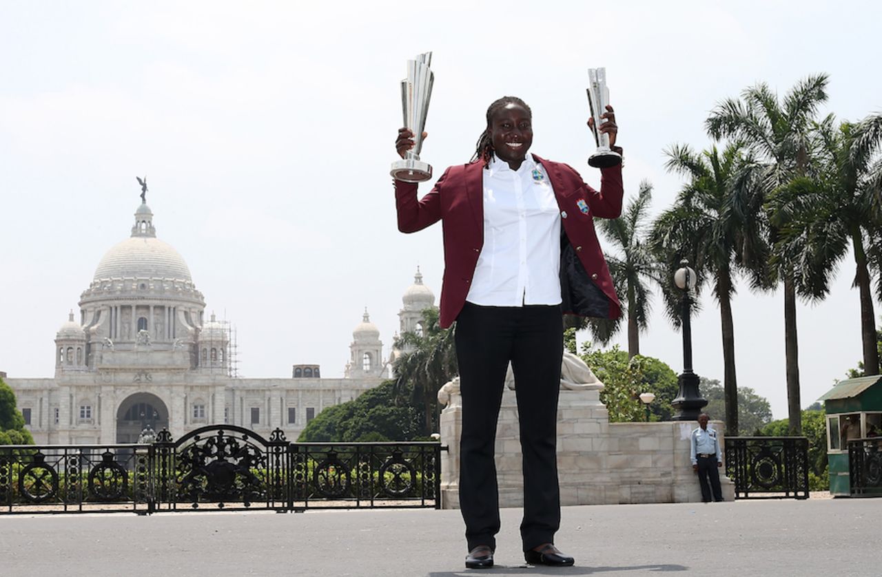Stafanie Taylor is all smiles with the World T20 and the Player-of-the-Series trophies, Kolkata, April 4, 2016