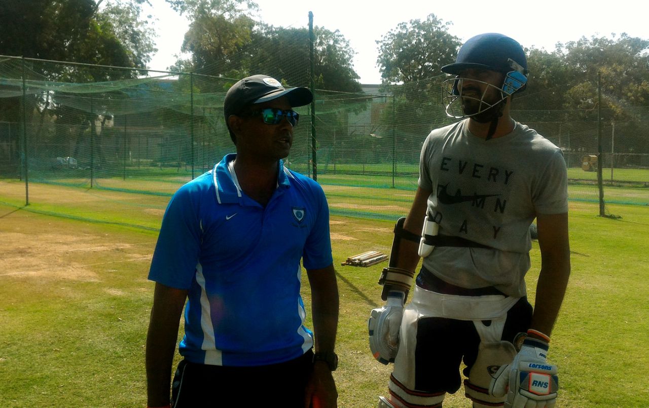 Krunal Pandya talks to his coach Jitendra Singh in Vadodara