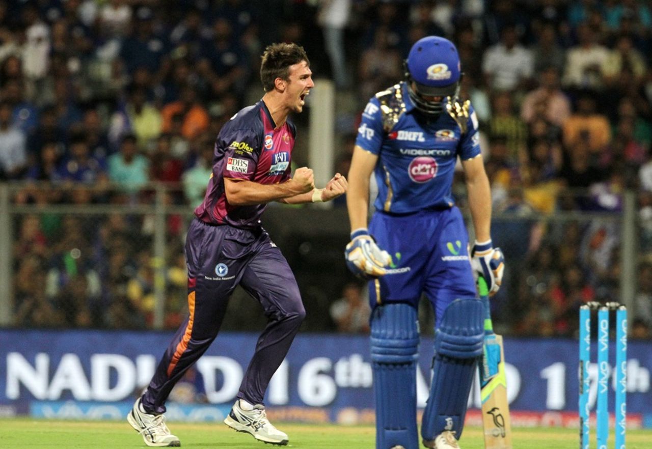 A dejected Jos Buttler leaves the field after being dismissed even as Mitchell Marsh celebrates, Mumbai Indians v Rising Pune Supergiants, IPL 2016, Mumbai, April 9, 2016