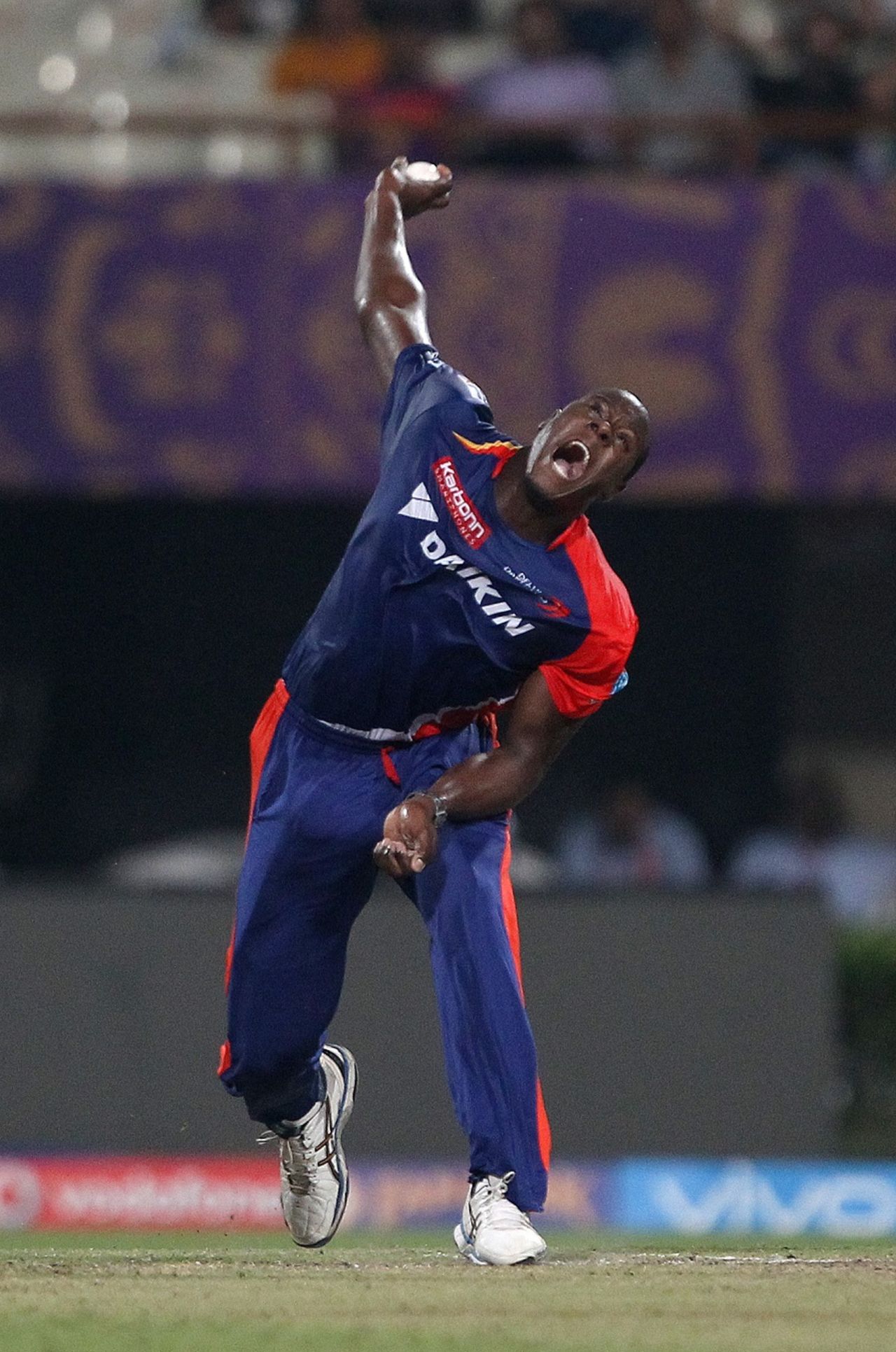 Carlos Brathwaite gives it his all as he prepares to deliver the ball, Kolkata Knight Riders v Delhi Daredevils, IPL 2016, Kolkata, April 10, 2016