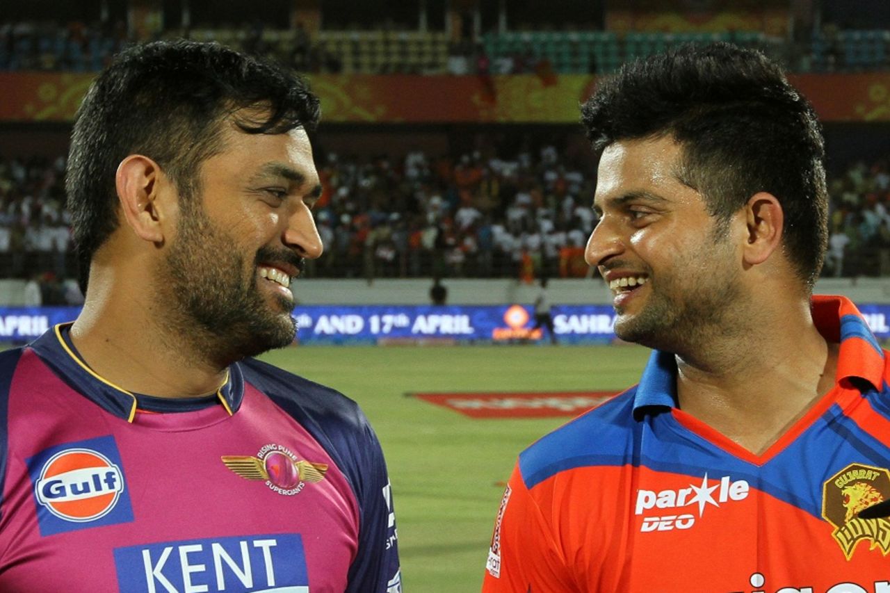 MS Dhoni and Suresh Raina find a reason to smile at the toss, Gujarat Lions v Rising Pune Supergiants, IPL 2016, Rajkot, April 14, 2016