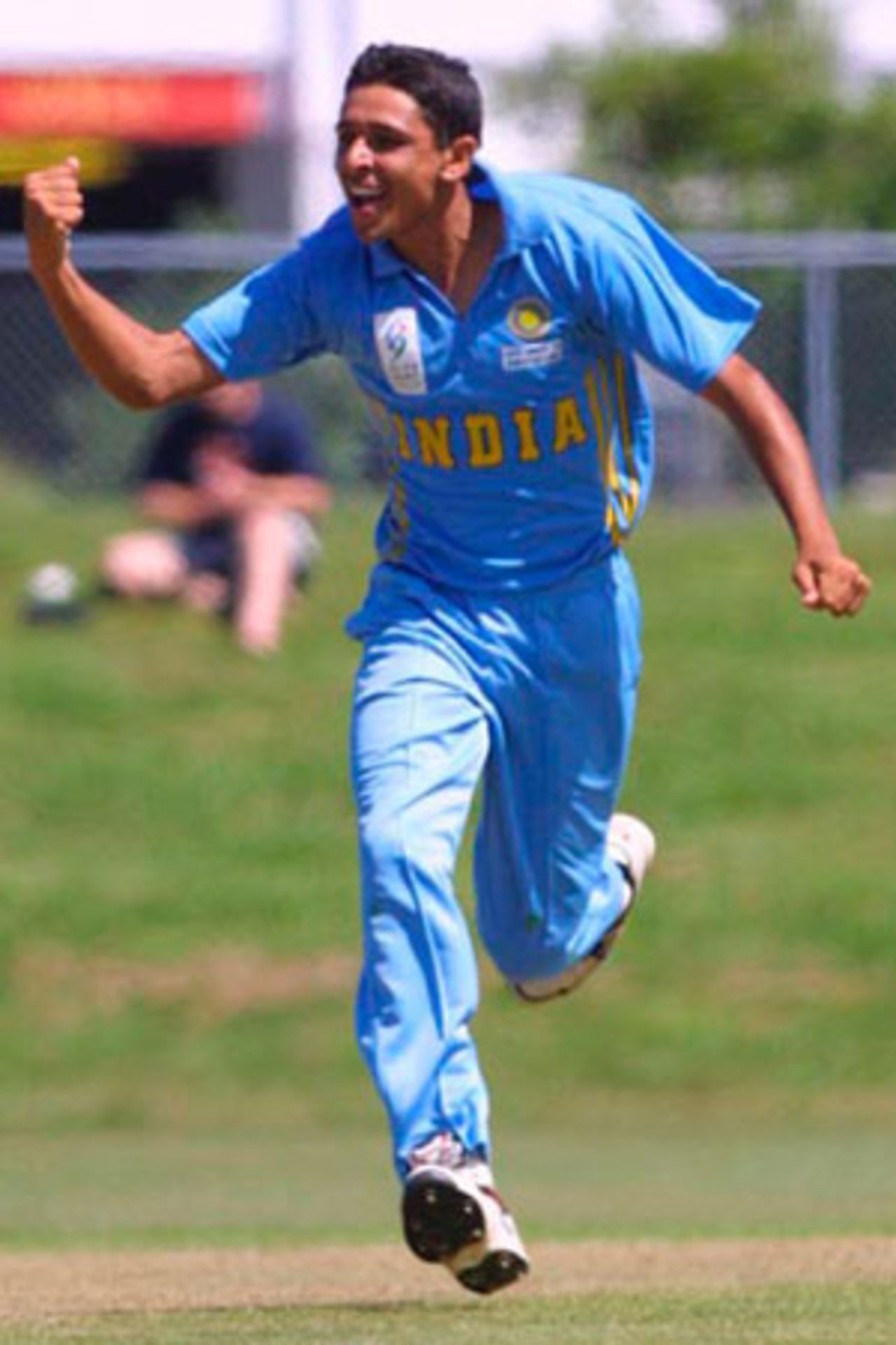 India Under-19 bowler Maninder Bisla celebrates the dismissal of South Africa Under-19 batsman Hashim Amla, caught by Paul Valthaty for 0. ICC Under-19 World Cup Group A: India Under-19s v South Africa Under-19s at North Harbour Stadium, Auckland, 23 January 2002.