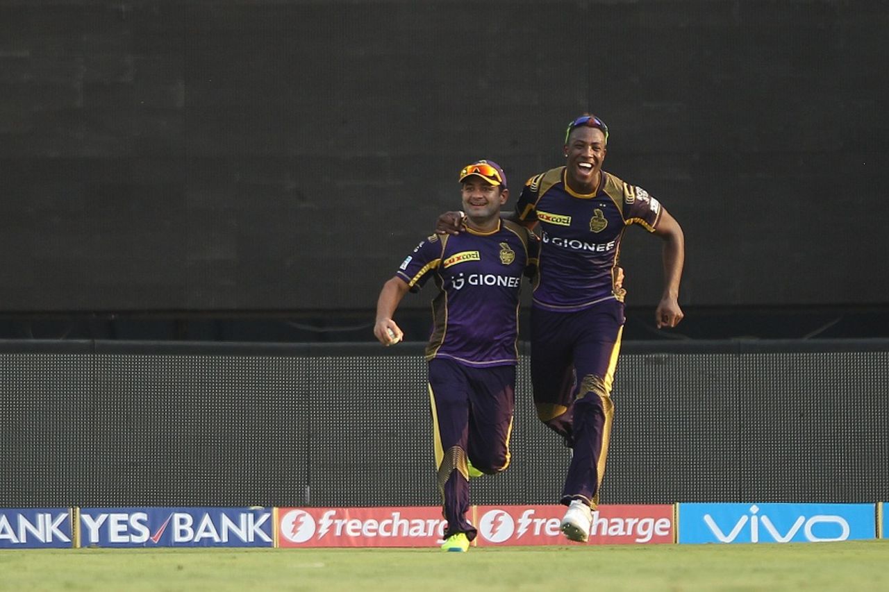 Piyush Chawla and Andre Rusell celebrate after completing an outstanding relay catch, Sunrisers Hyderabad v Kolkata Knight Riders, IPL 2016, Hyderabad, April 16, 2016