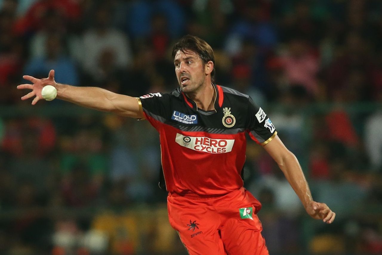 David Wiese sticks his hand out to field off his own bowling, Royal Challengers Bangalore v Delhi Daredevils, IPL 2016, Bangalore, April 17, 2016