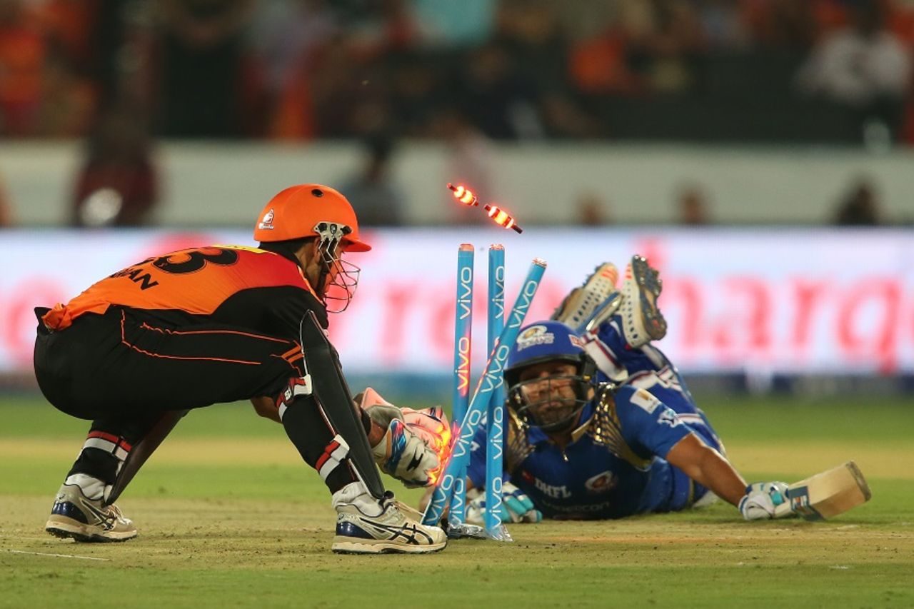 Rohit Sharma is caught short of his crease after being denied a single, Sunrisers Hyderabad v Mumbai Indians, IPL 2016, Hyderabad, April 18, 2016