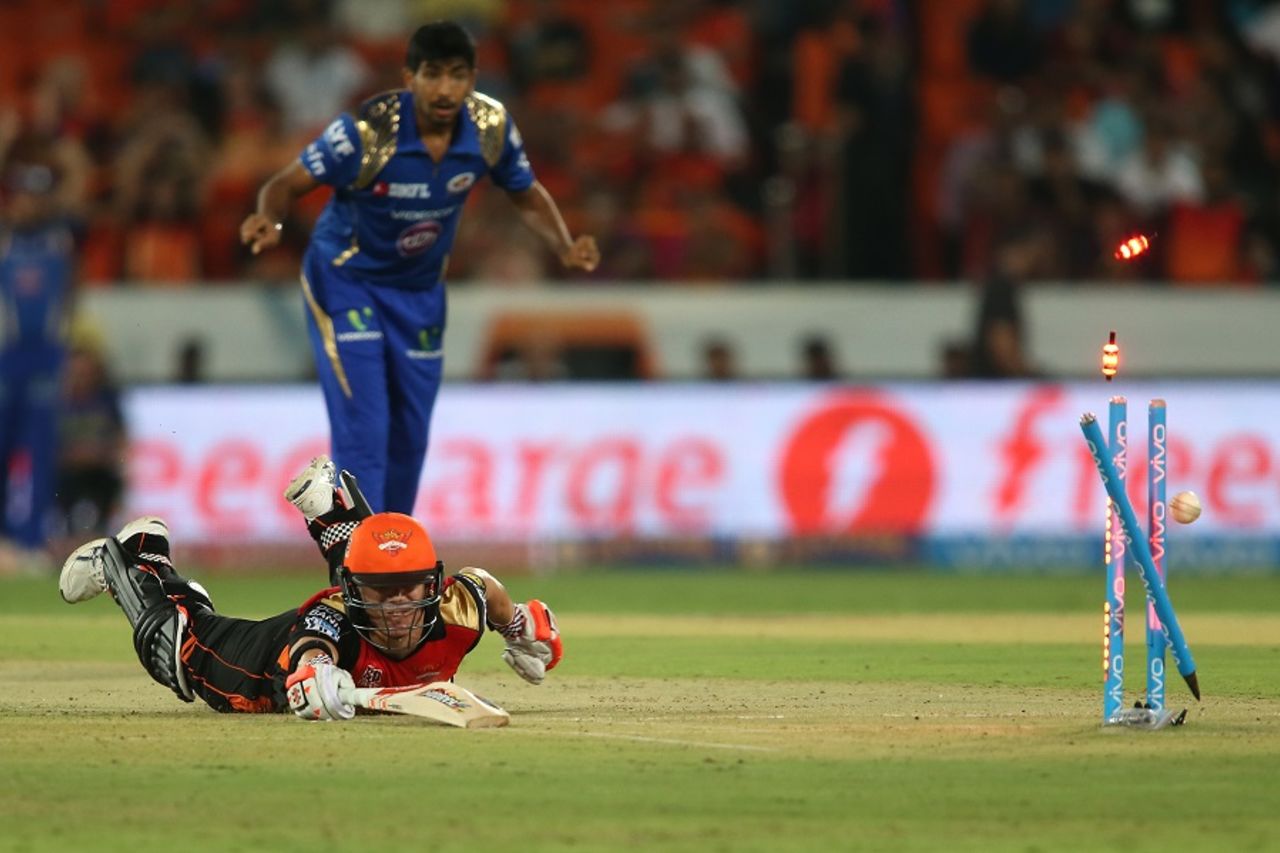 David Warner dives to make his ground even as the stumps are broken, Sunrisers Hyderabad v Mumbai Indians, IPL 2016, Hyderabad, April 18, 2016