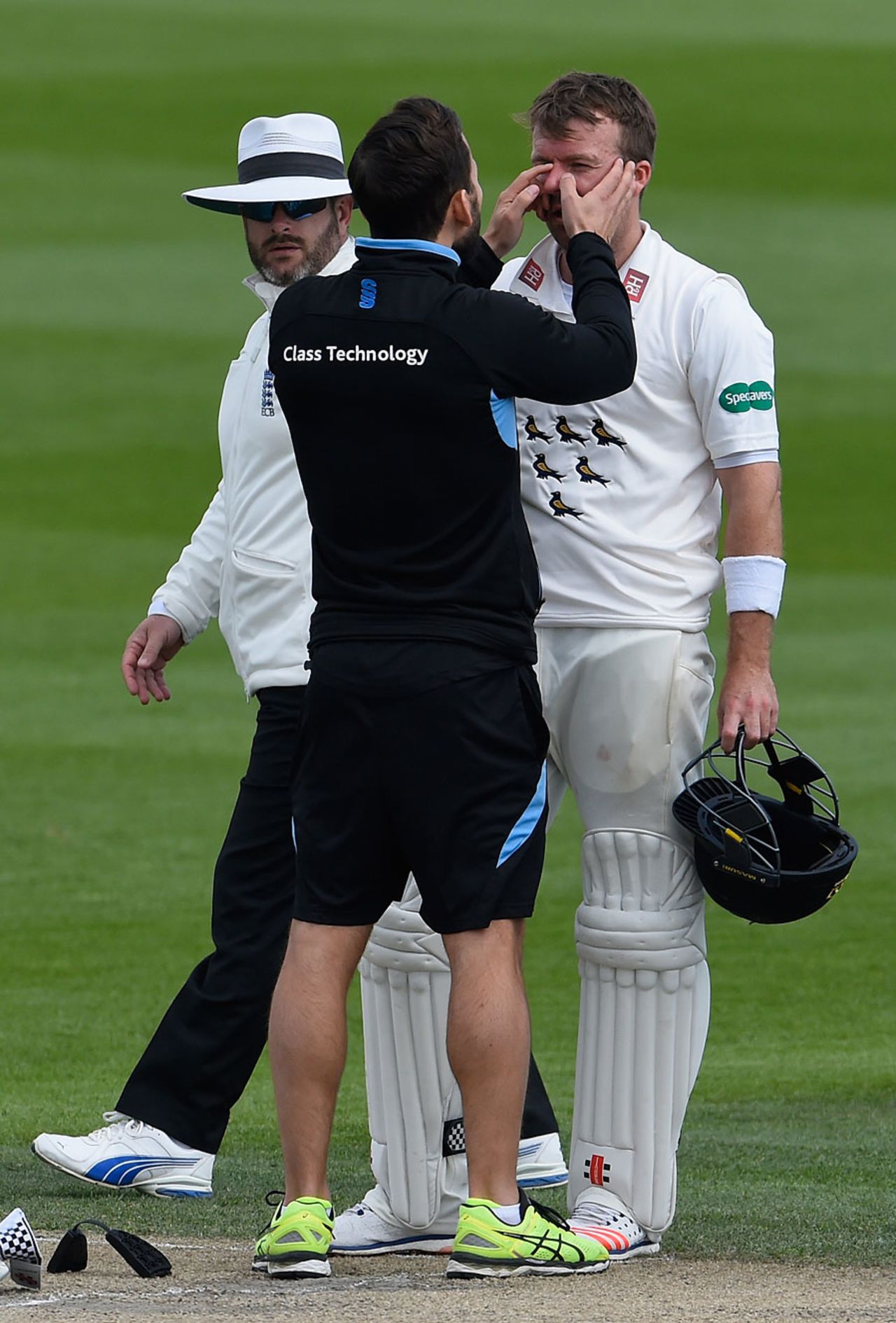 Chris Nash gets checked over by the physio, Sussex v Essex, County Championship, Division Two, Hove, 3rd day, April 19, 2016