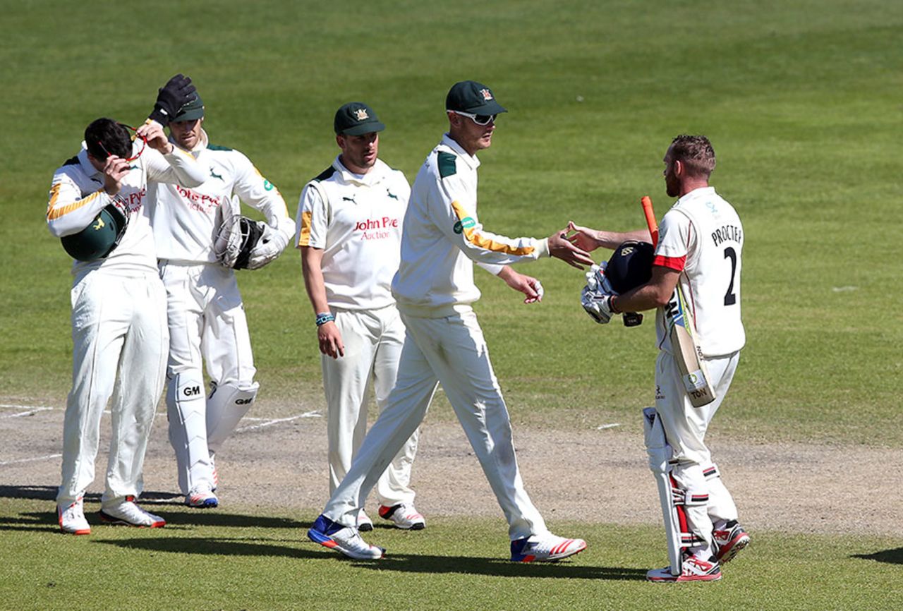 Luke Procter is congratulated by Stuart Broad after sealing Lancashire's victory, Lancashire v Nottinghamshire, Specsavers County Championship, Division One, Old Trafford, 4th day, April 20, 2016