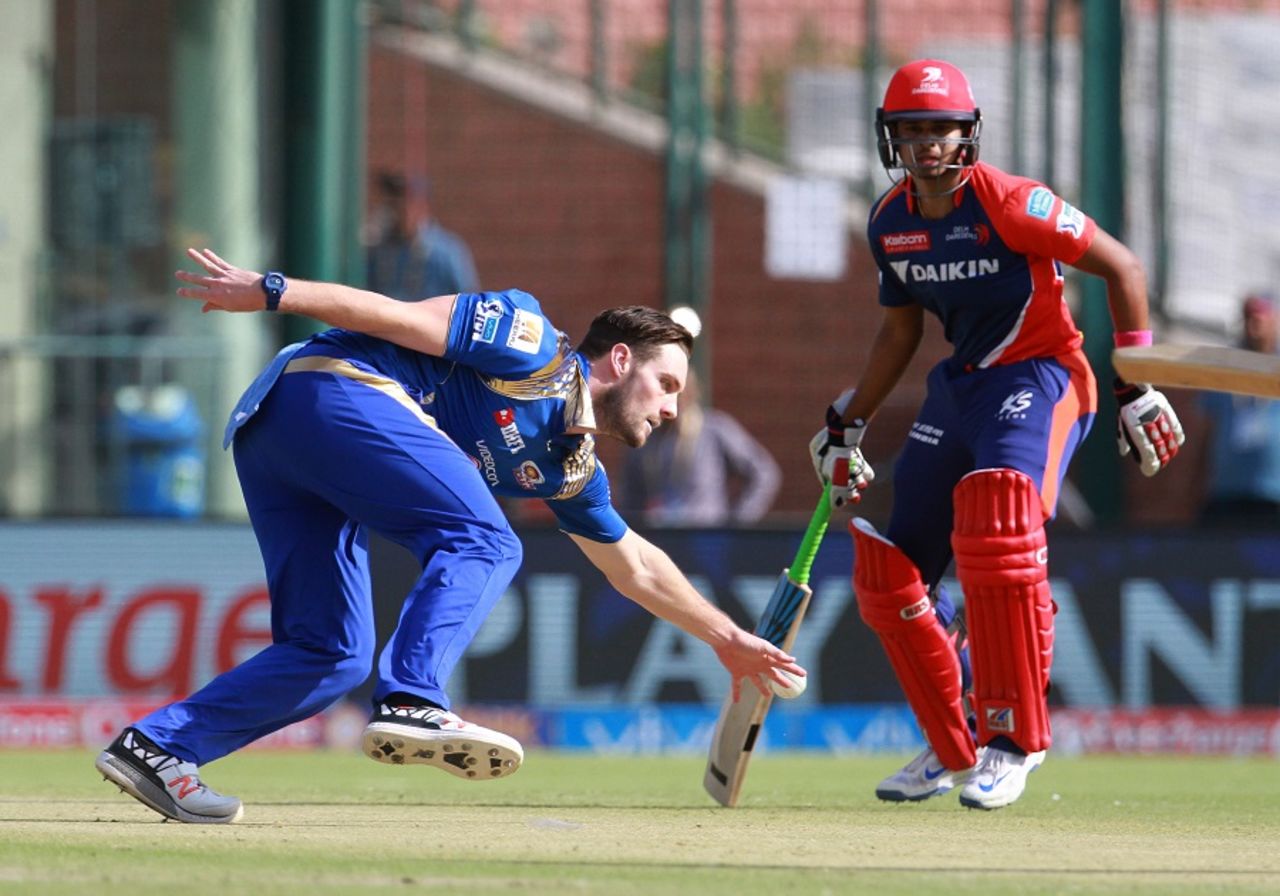 Mitchell McClenaghan tries to field off his own bowling, Delhi Daredevils v Mumbai Indians, IPL 2016, Delhi, April 23, 2016