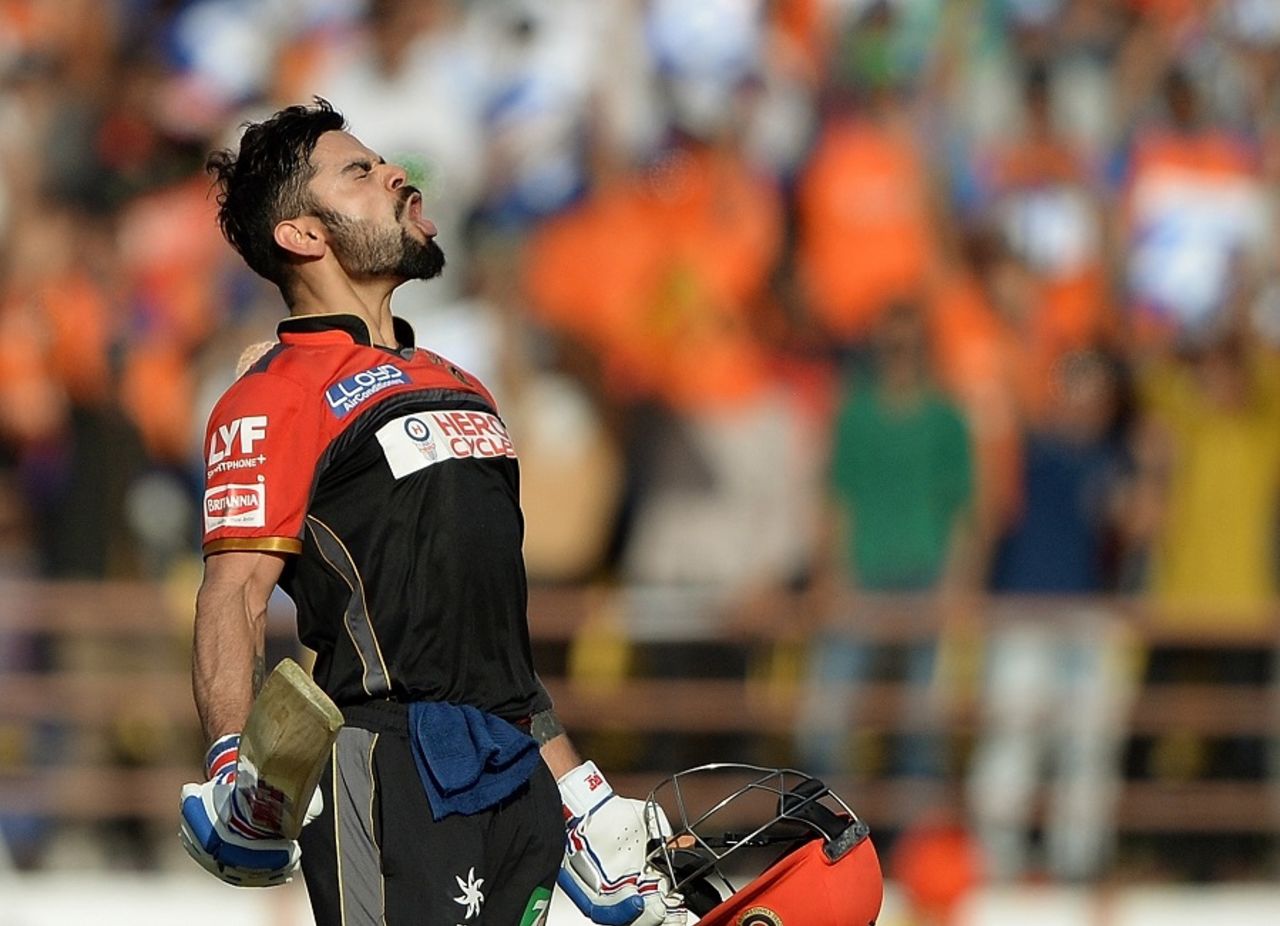 Virat Kohli is animated in celebration after reaching his century off the last ball of the innings, Gujarat Lions v Royal Challengers Bangalore, IPL 2016, Rajkot, April 24, 2016