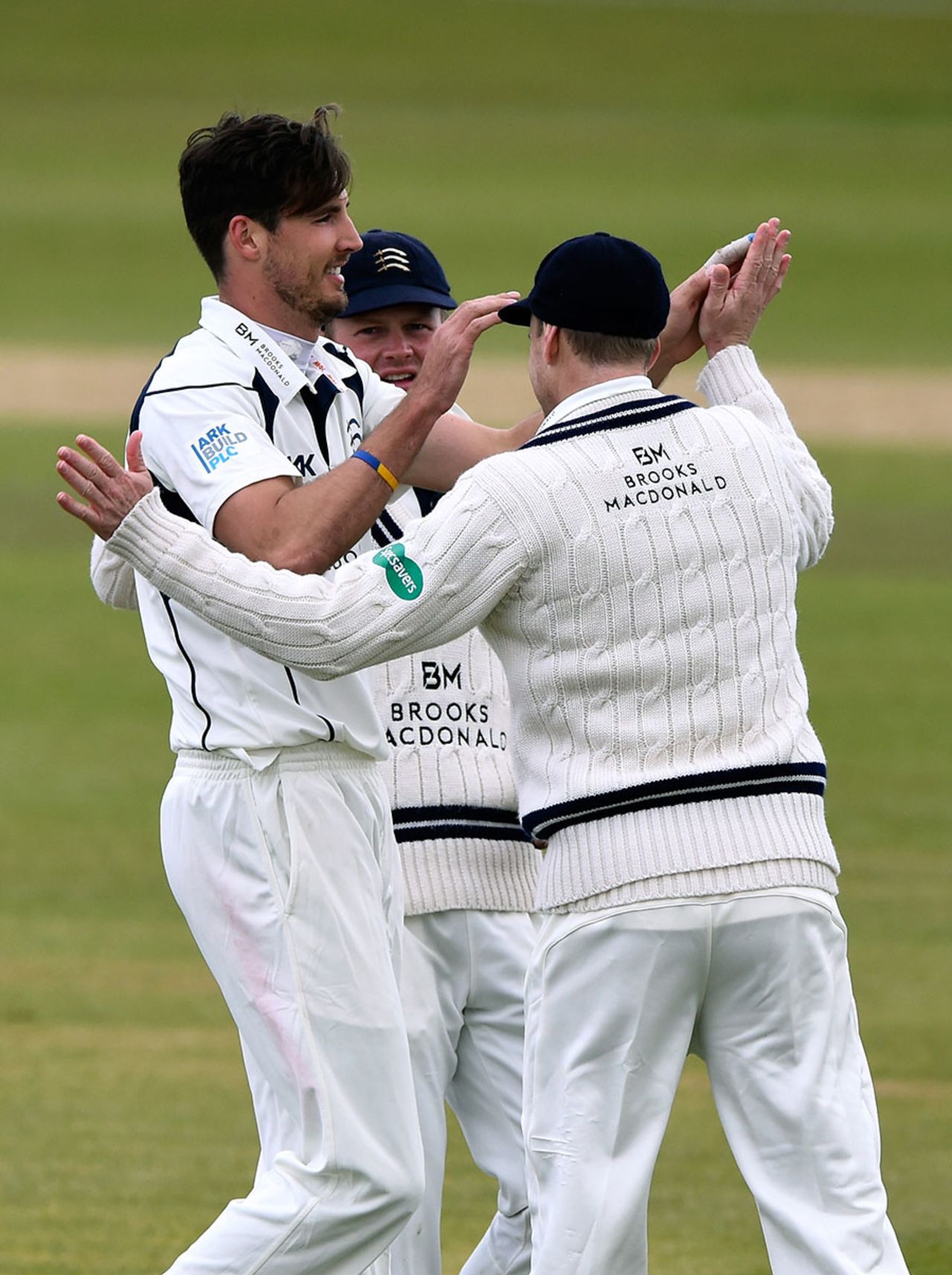 Steven Finn is congratulated after claiming the wicket of Keaton Jennings, Durham v Middlesex, County Championship, Division One, Chester-le-Street, 2nd day, April 25, 2015
