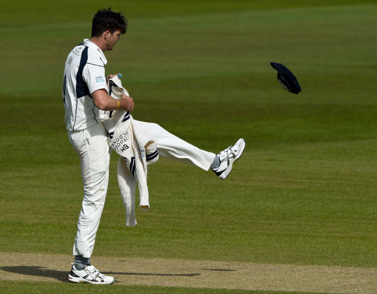 Steven Finn kicks away his cap in frustration, Durham v Middlesex, County Championship, Division One, Chester-le-Street, 2nd day, April 25, 2015