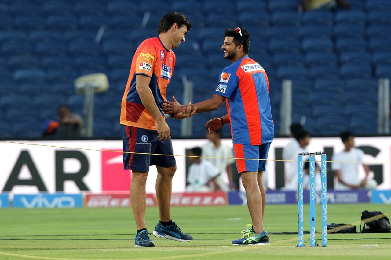 Former CSK mates catch up - Rising Pune Supergiants coach Stephen Fleming and Gujarat Lions captain Suresh Raina share a lighter moment, Rising Pune Supergiants v Gujarat Lions, IPL 2016, Pune, April 29, 2016