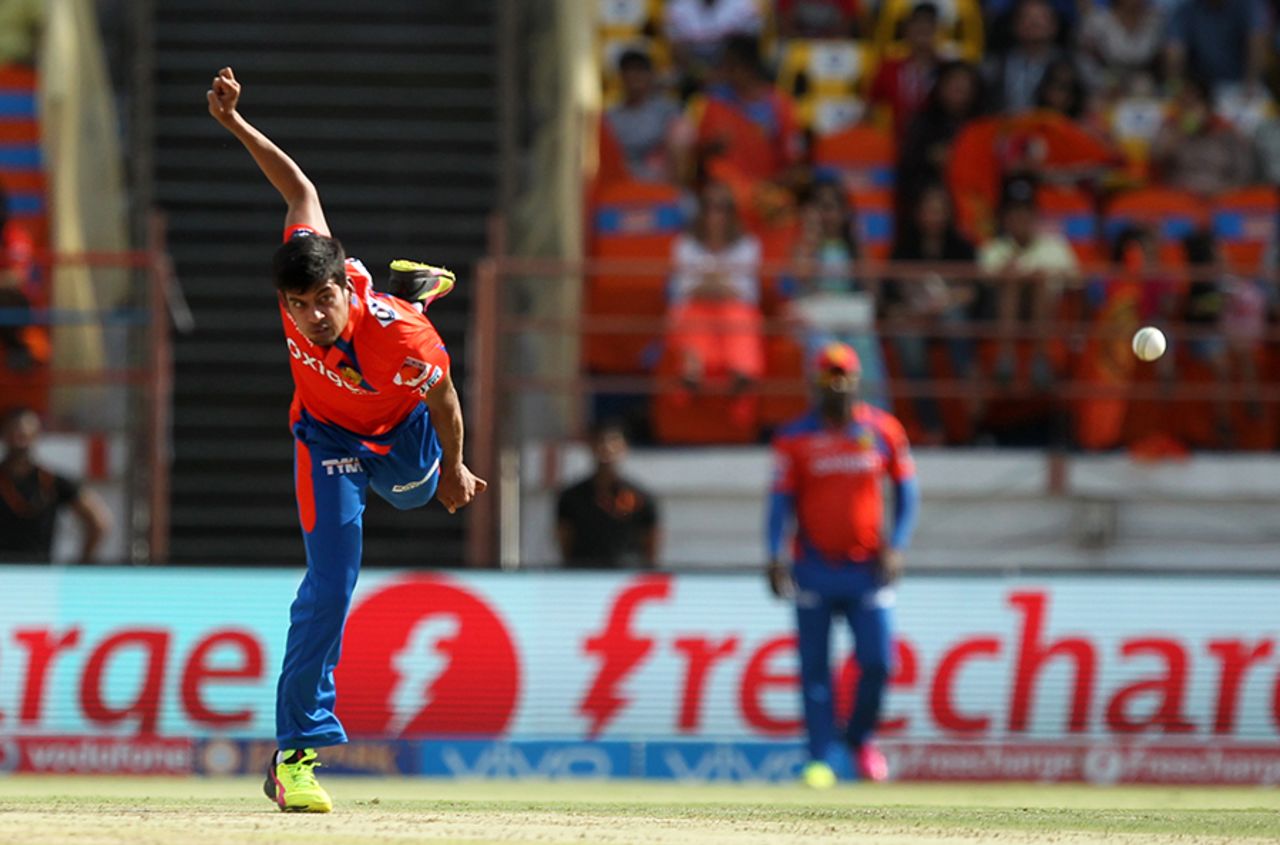 Chinaman bowler Shivil Kaushik in his delivery stride, Gujarat Lions v Kings XI Punjab, IPL 2016, Rajkot, May 1, 2016