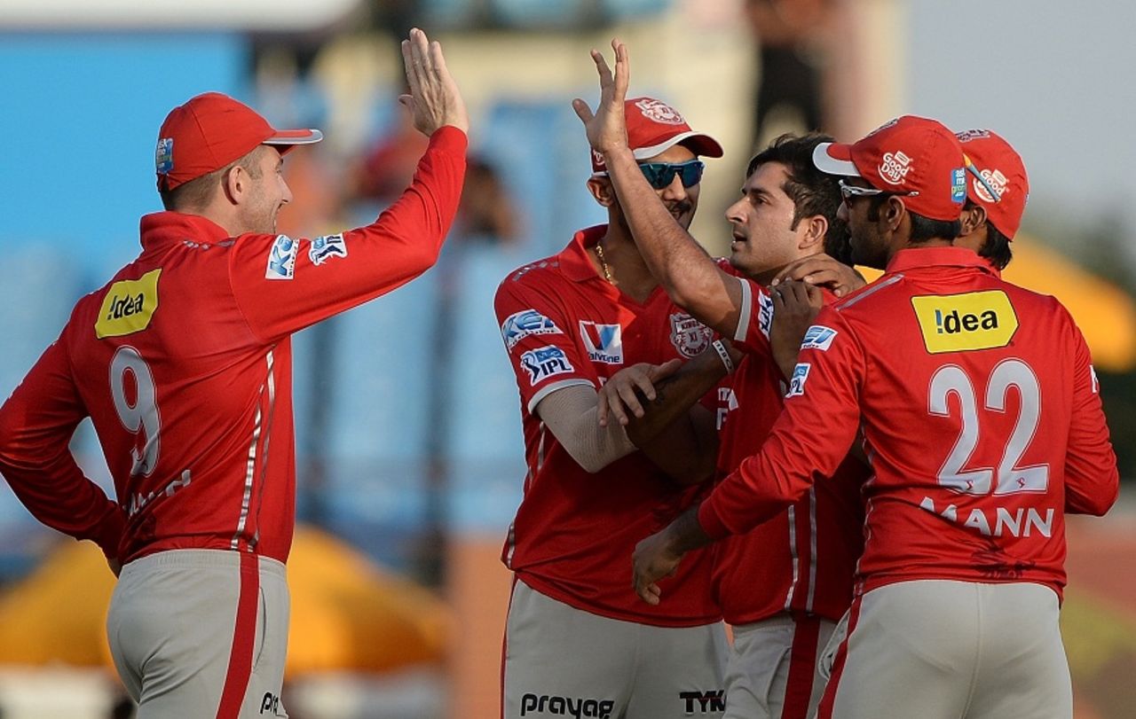 Mohit Sharma is mobbed by his team-mates after picking up a wicket, Gujarat Lions v Kings XI Punjab, IPL 2016, Rajkot, May 1, 2016
