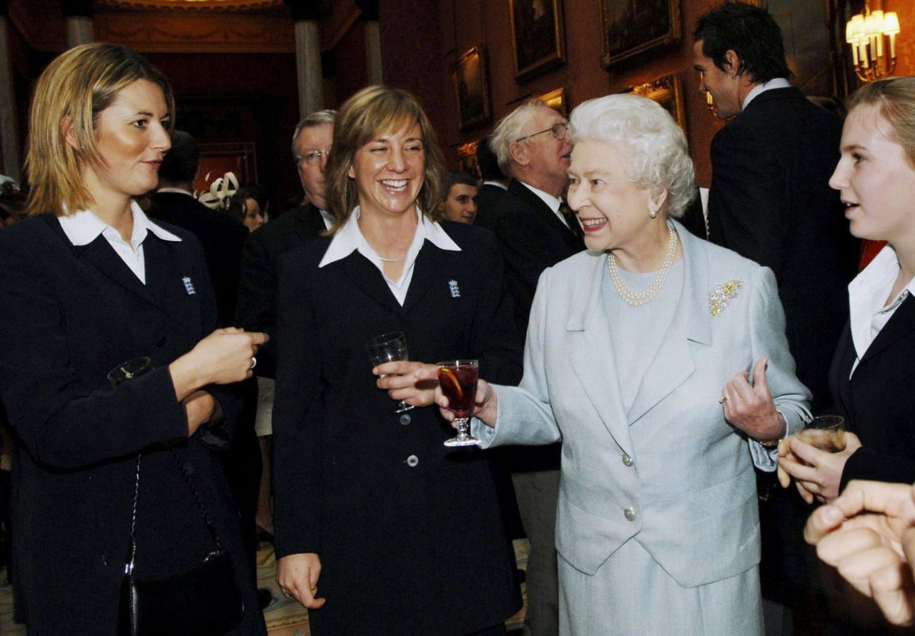 Queen Elizabeth with the Ashes-winning England women's cricketers invested the women's at Buckingham Palace, London, February 9, 2006