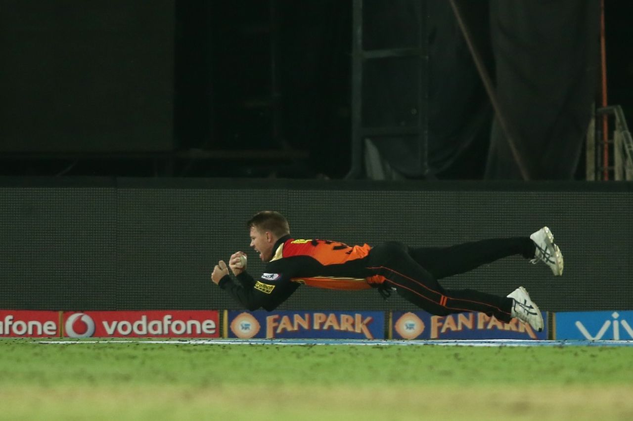 David Warner shows his acrobatic side as he takes a catch to dismiss Brendon McCullum, Sunrisers Hyderabad v Gujarat Lions, IPL 2016, Hyderabad, May 6, 2016