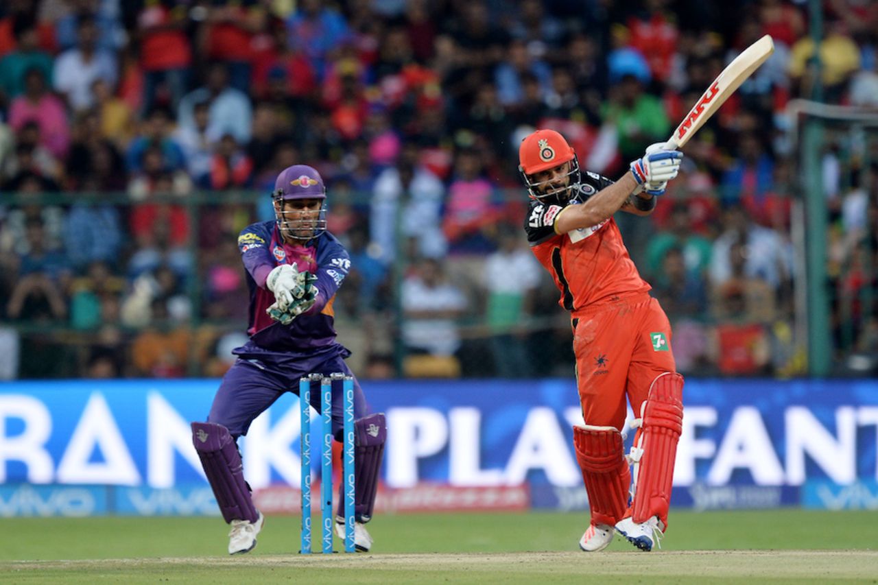 Virat Kohli muscles some power into a shot, Royal Challengers Bangalore v Rising Pune Supergiants, IPL 2016, Bangalore, May 7, 2016