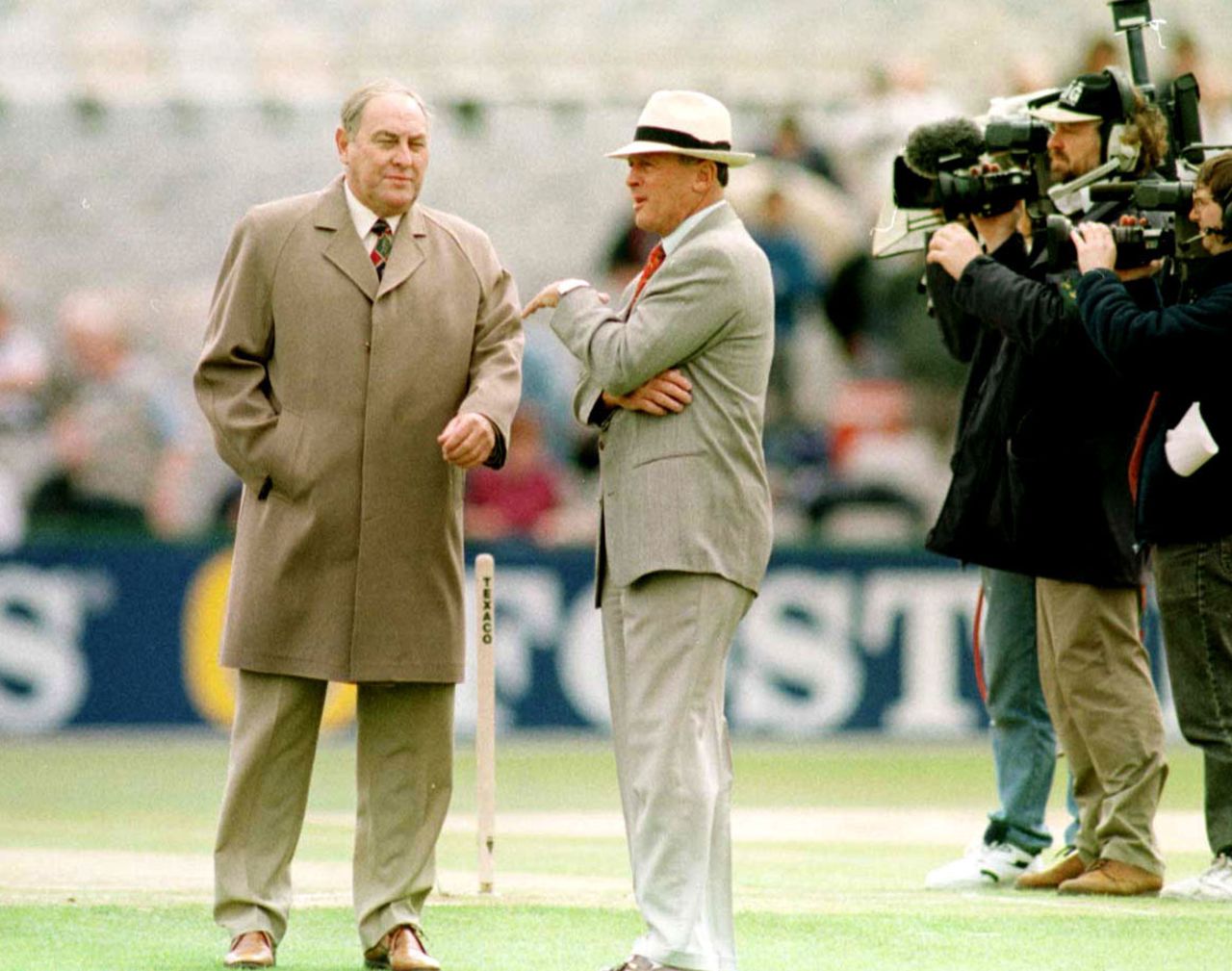 England chairman of selectors Ray Illingworth (left) talks to Geoffrey Boycott before the start of play, England v India, third ODI, Old Trafford, May 27, 1996 
