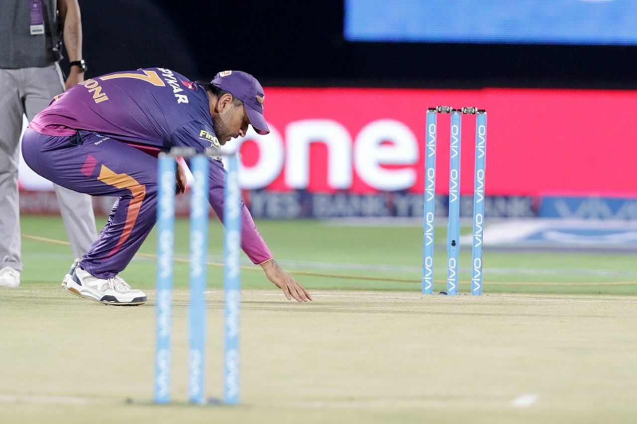 MS Dhoni examines the pitch before the game, Rising Pune Supergiants v Sunrisers Hyderabad, IPL 2016, Visakhapatnam, May 10, 2016
