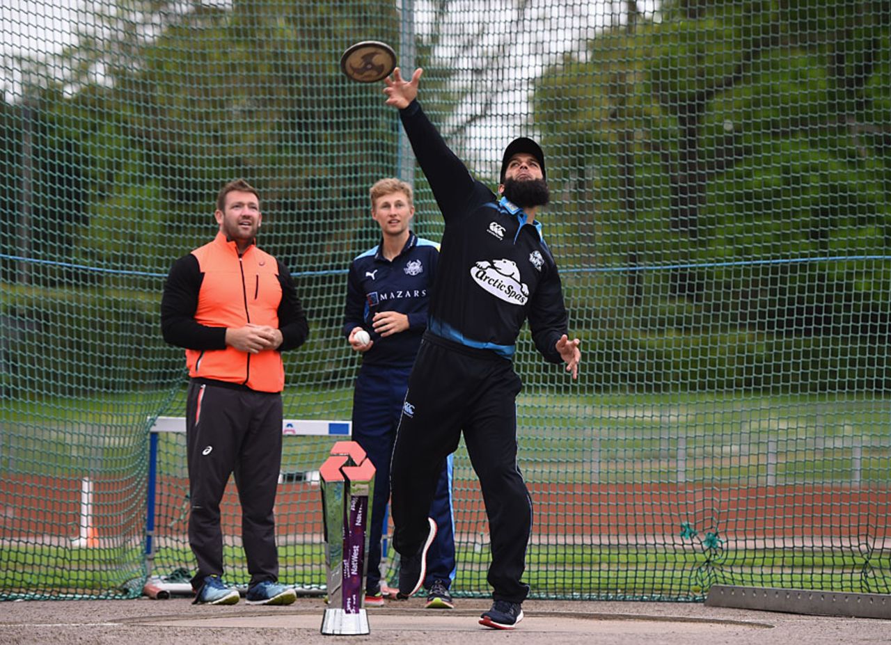 Moeen Ali tries out the discus, Loughborough, May 13, 2016