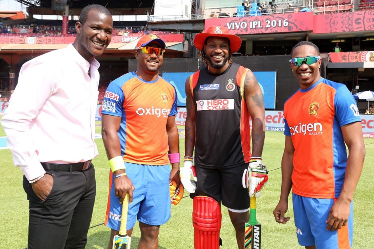 West Indies' Darren Sammy, Dwayne Smith, Chris Gayle and Dwayne Bravo have a word before the match, Royal Challengers Bangalore v Gujarat Lions, IPL 2016, Bangalore, May 14, 2016