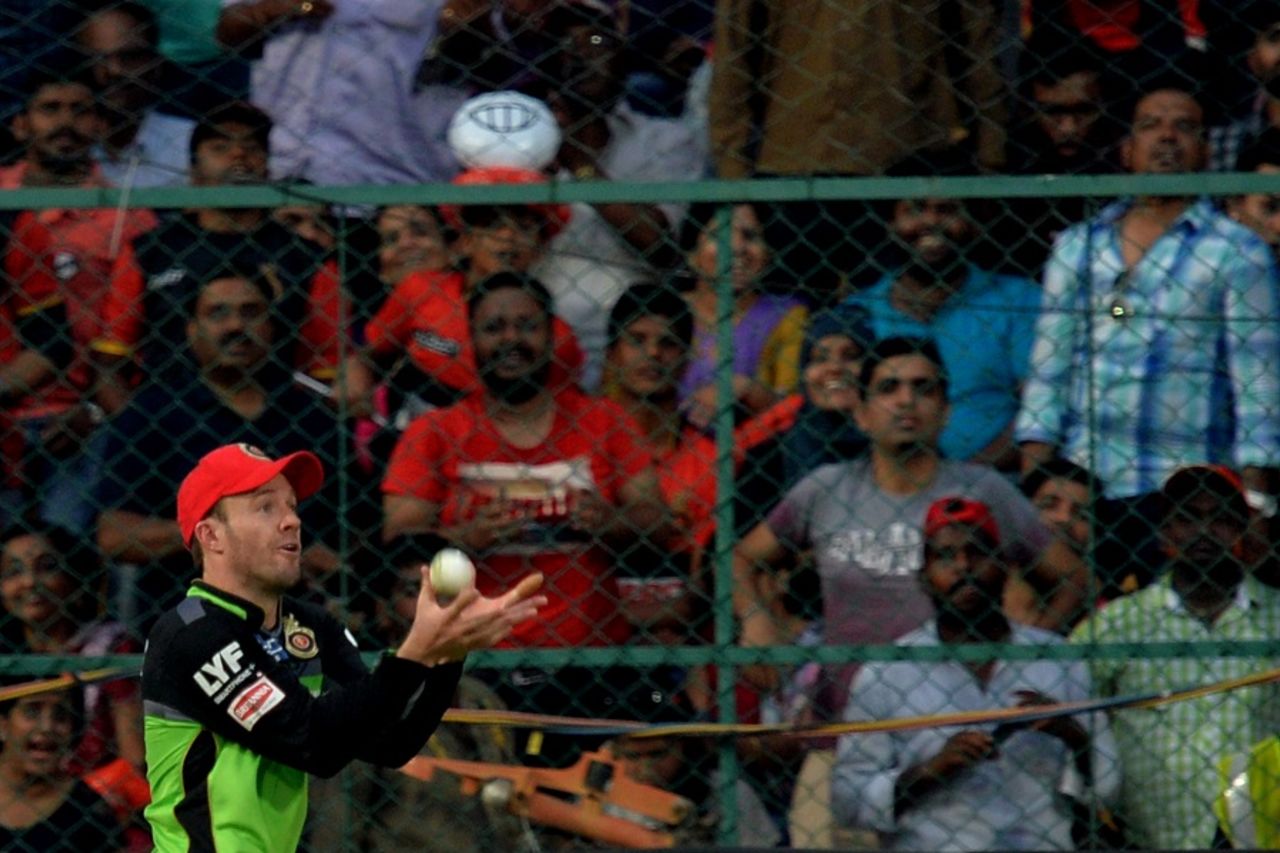AB de Villiers takes a catch to dismiss Dinesh Karthik, Royal Challengers Bangalore v Gujarat Lions, IPL 2016, Bangalore, May 14, 2016
