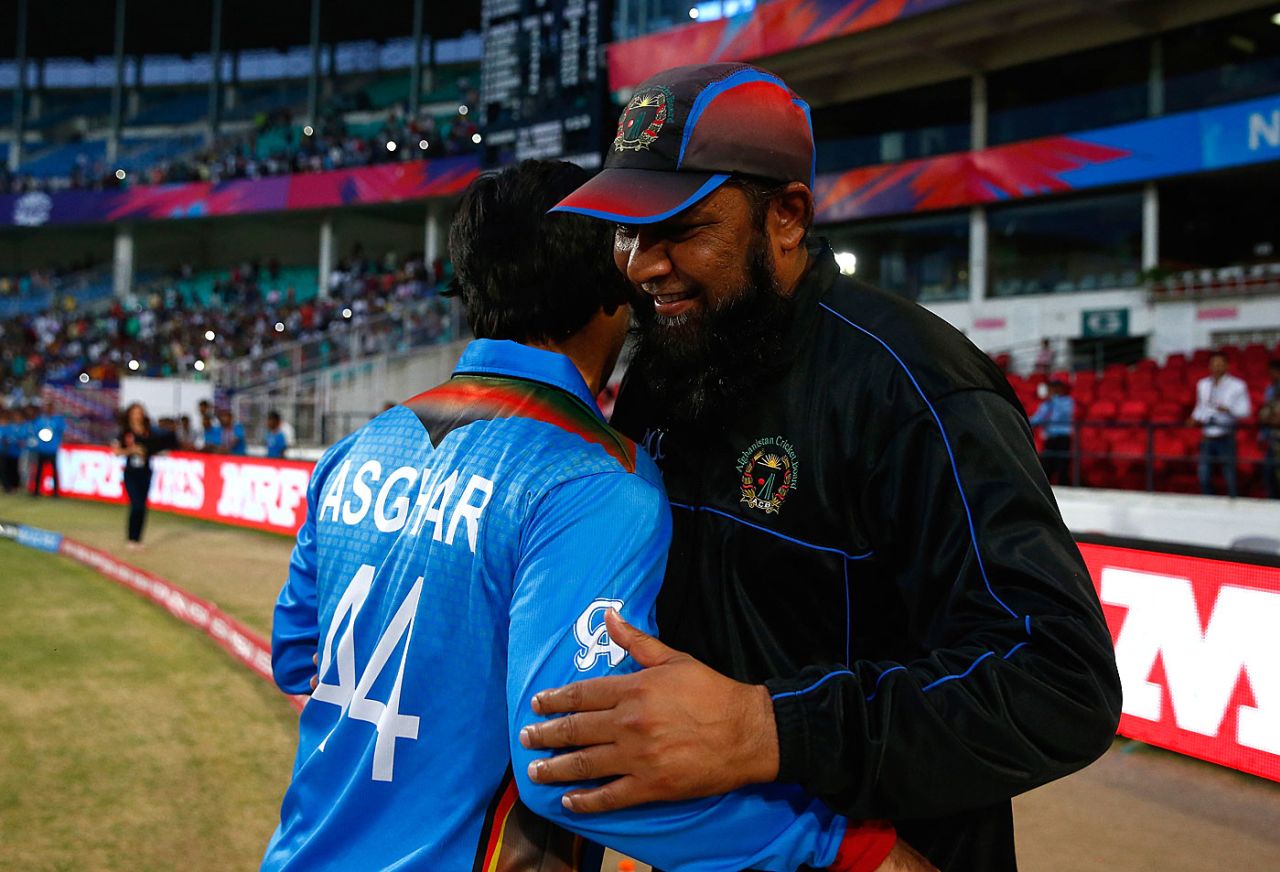 Inzamam-ul-Haq hugs Asghar Stanikzai after the win, Afghanistan v West Indies, World T20 2016, Group 1, Nagpur, March 27, 2016