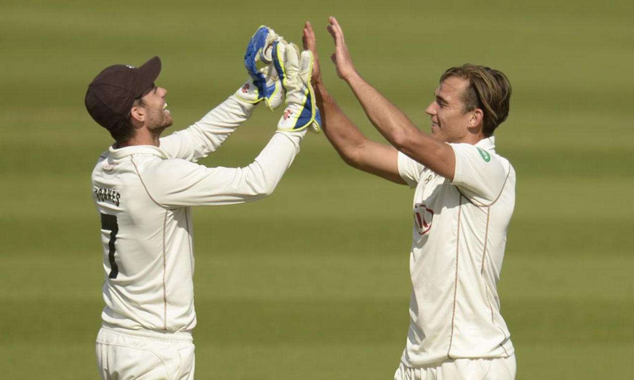James Burke gets a high five from wicketkeeper Ben Foakes, Surrey v Middlesex, County Championship, Division One, The Oval, 1st day, May 15, 2016