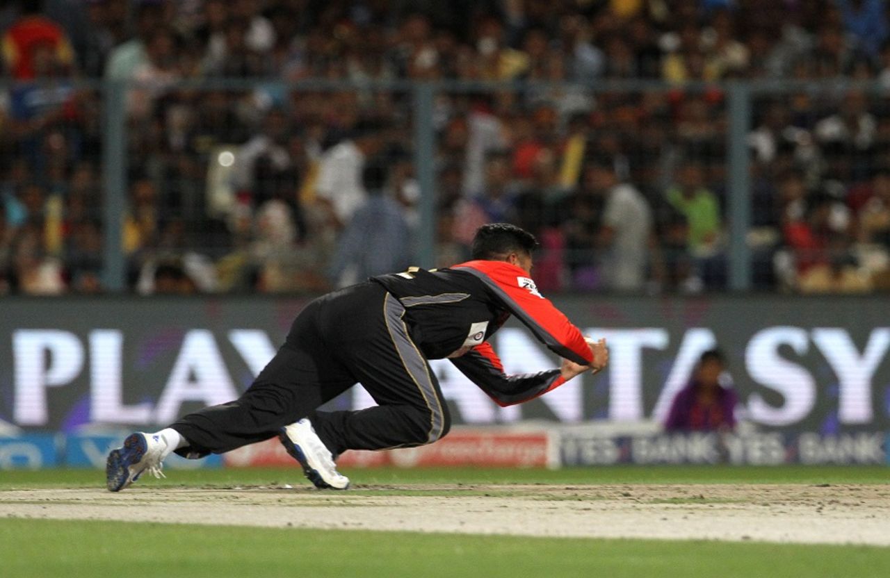 Iqbal Abdulla takes a catch off his own bowling to dismiss Robin Uthappa, Kolkata Knight Riders v Royal Challengers Bangalore, IPL 2016, Kolkata, May 16, 2016