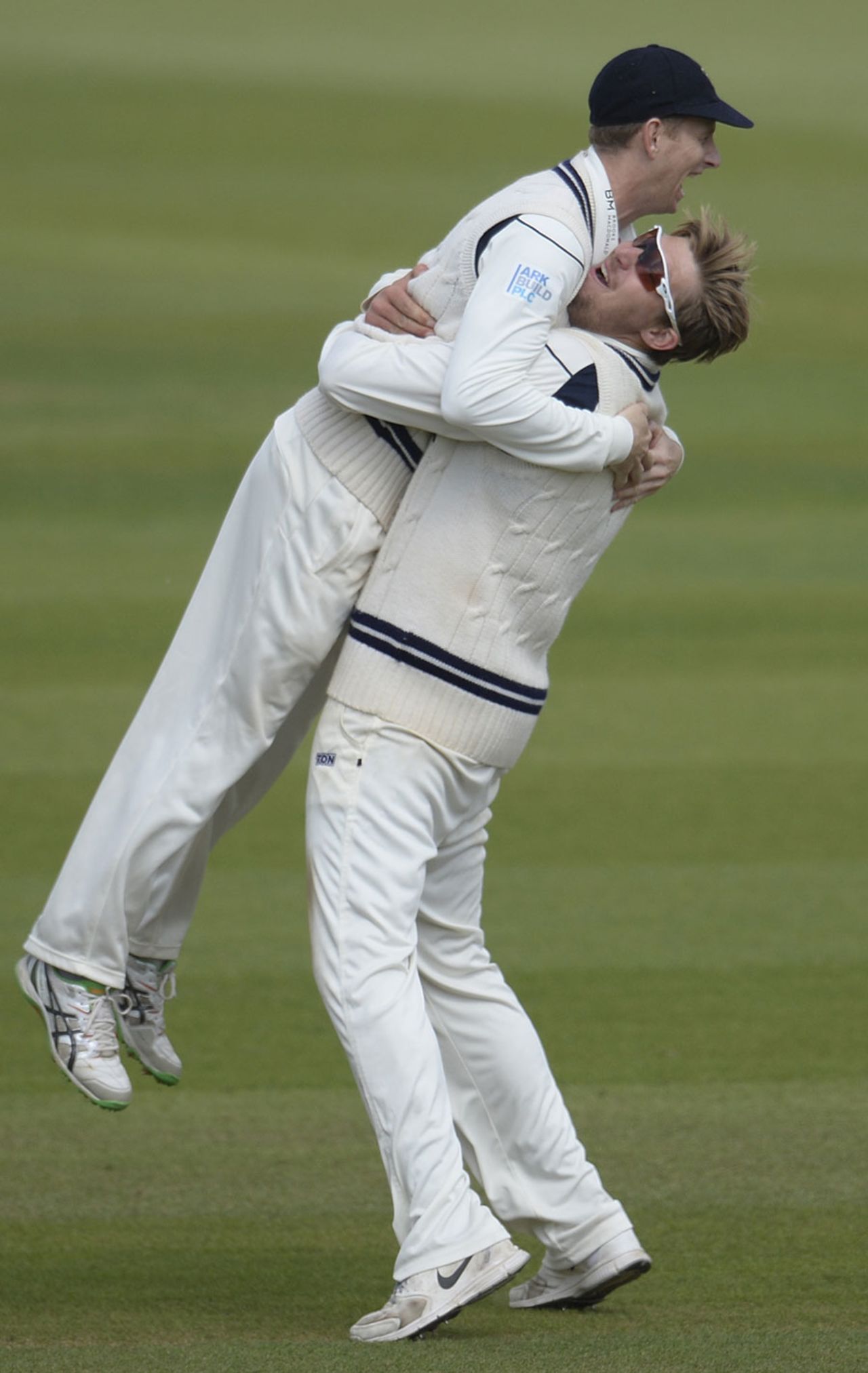 Adam Voges and Ollie Rayner celebrate the wicket of Kumar Sangakkara, Surrey v Middlesex, County Championship, Division One, Kia Oval, 2nd day, May 16, 2016