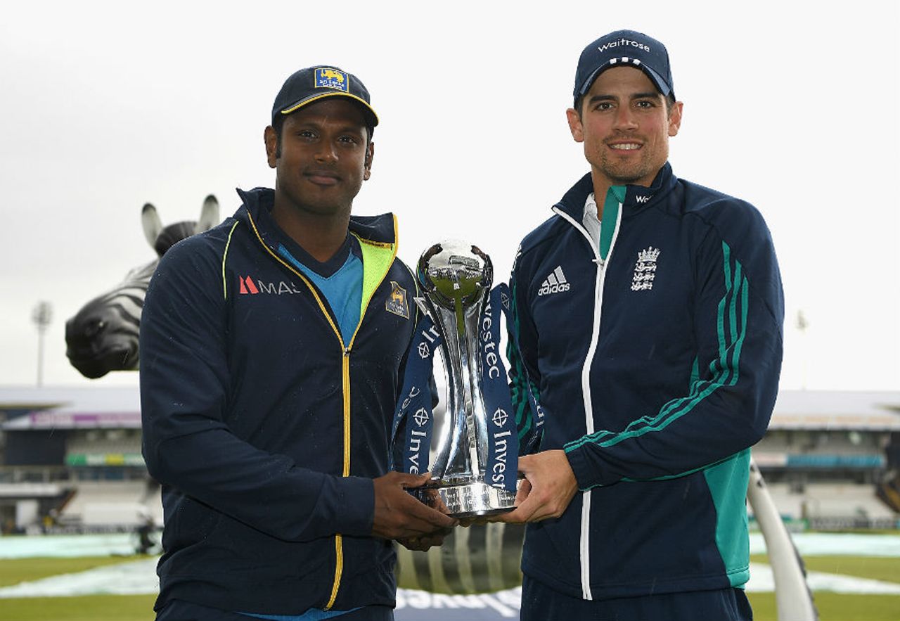 Alastair Cook and Angelo Mathews pose with the Investec trophy, England v Sri Lanka, first Test, Headingley, May 18, 2016