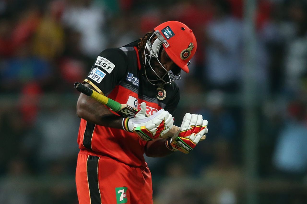 Chris Gayle, who recently became a dad for the first time, celebrates his fifty by rocking his bat, Royal Challengers Bangalore v Kings XI Punjab, IPL 2016, Bangalore, May 18, 2016