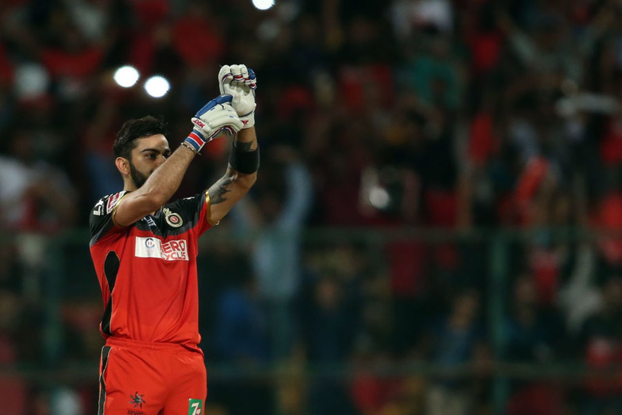 Virat Kohli points to his injured left hand after getting to a century, Royal Challengers Bangalore v Kings XI Punjab, IPL 2016, Bangalore, May 18, 2016