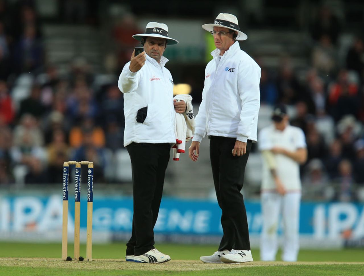 Aleem Dar and Rod Tucker check the light metres, England v Sri Lanka, 1st Test, Headingley, 2nd day, May 20, 2016